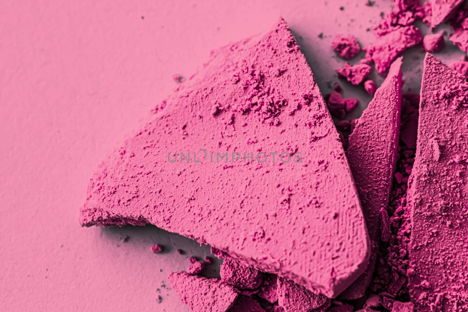 Pink eye shadow powder as makeup palette closeup, crushed cosmetics and beauty textures