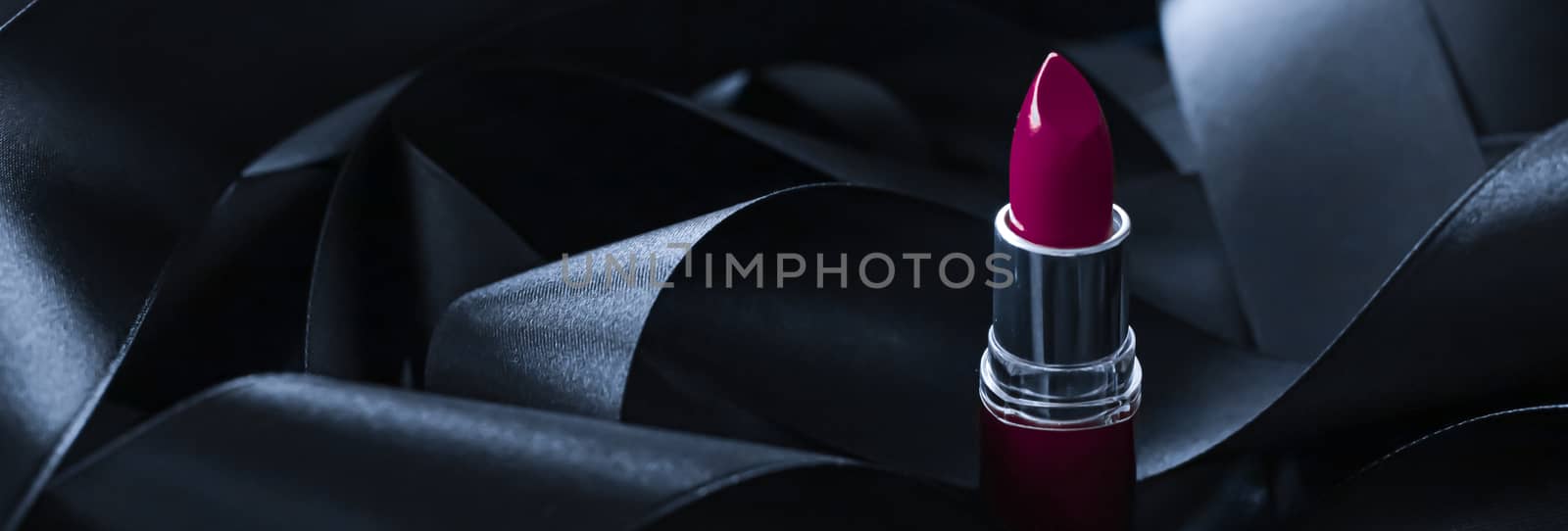 Purple lipstick on black silk background, luxury make-up and bea by Anneleven