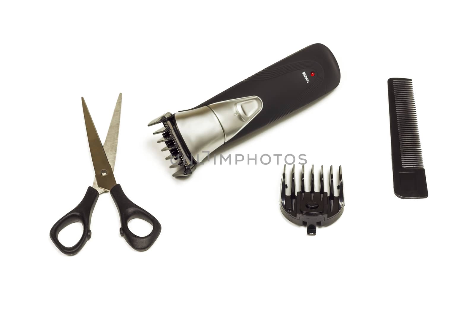 Hair clipper with nozzle, scissors and comb by Grommik