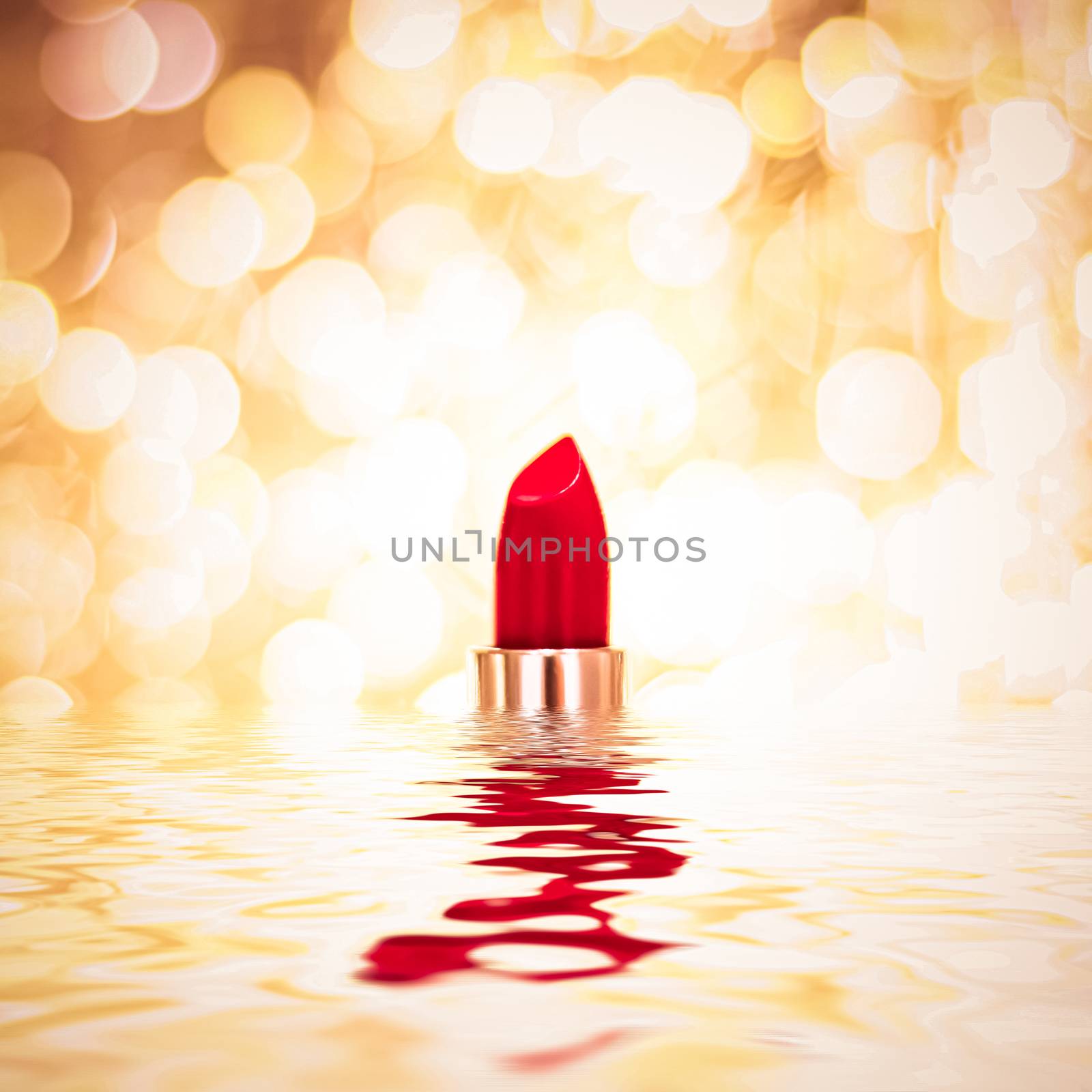 Red lipstick on golden background, make-up and cosmetic product by Anneleven