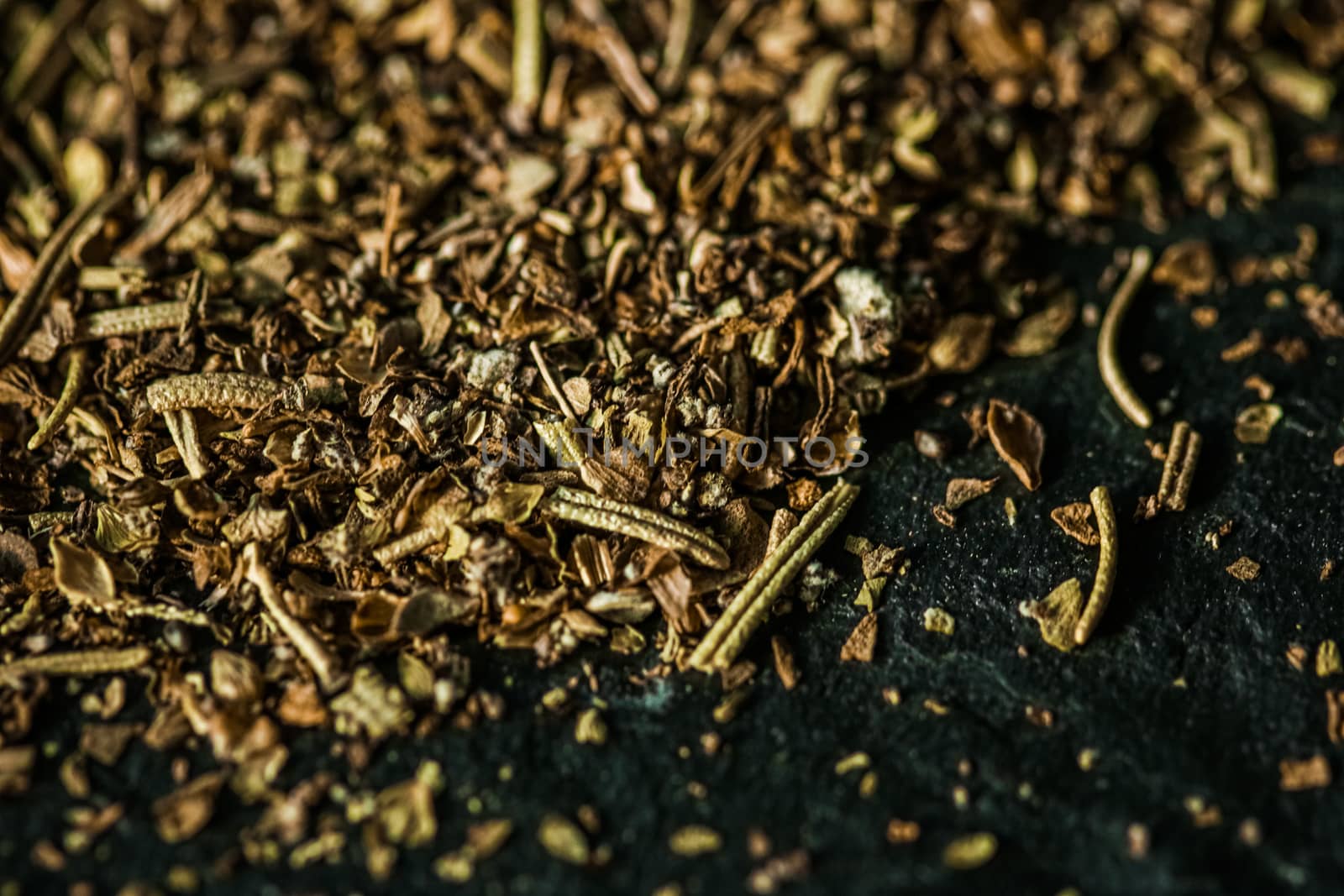 Provencal spices mix closeup on luxury stone background as flat lay, dry food spices and recipe ingredients