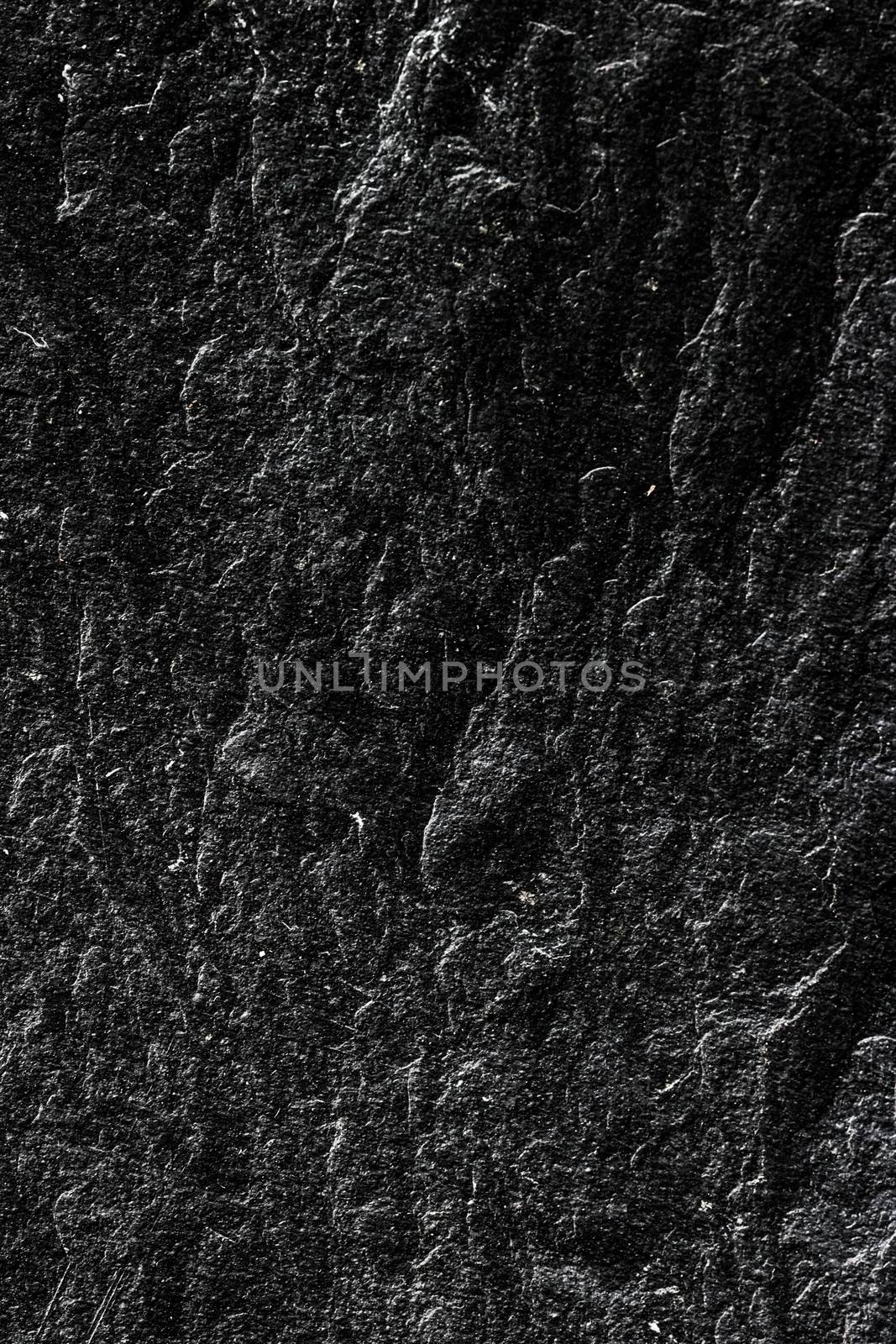 Black stone texture as abstract background, design material and textured surfaces