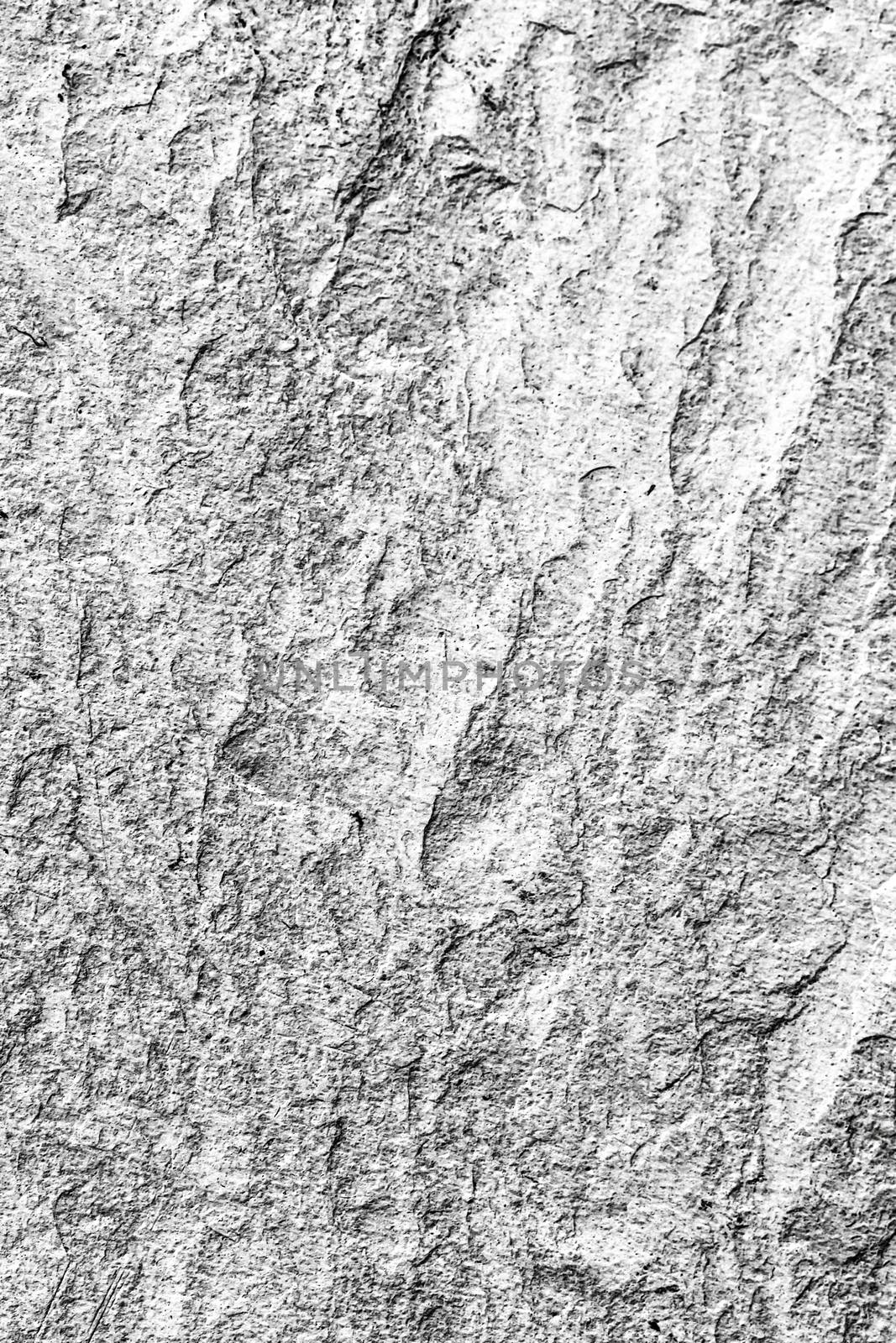 Light stone texture as abstract background, design material and textured surfaces