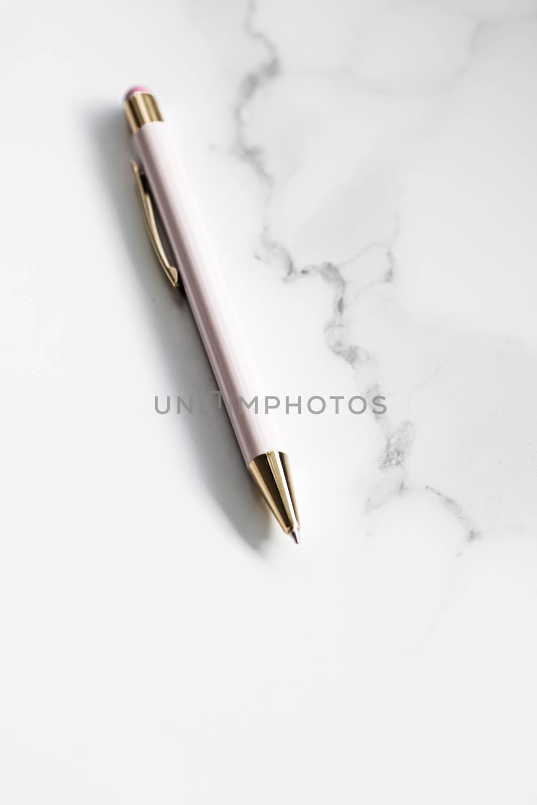 White pen on marble background, luxury stationery and business branding