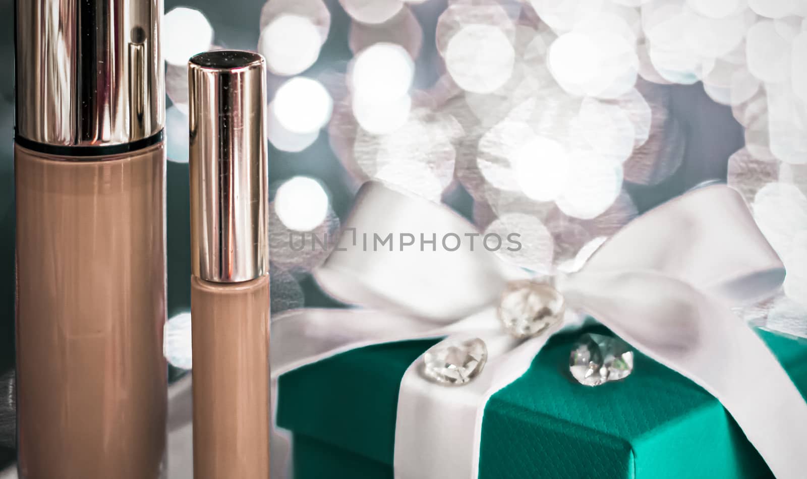 Cosmetic branding, Christmas glitter and girly blog concept - Holiday make-up foundation base, concealer and green gift box, luxury cosmetics present and blank label products for beauty brand design