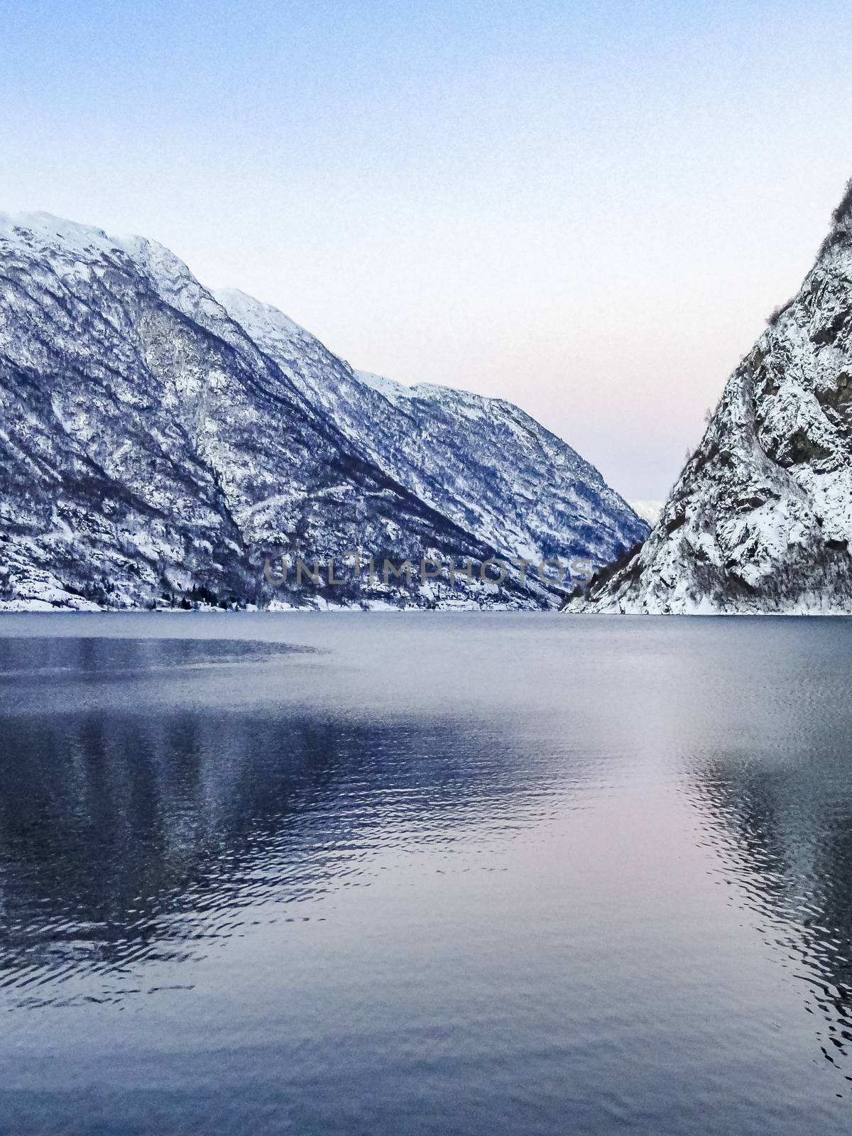 Winter landscape at the frozen fjord lake river, Framfjorden Norway. by Arkadij