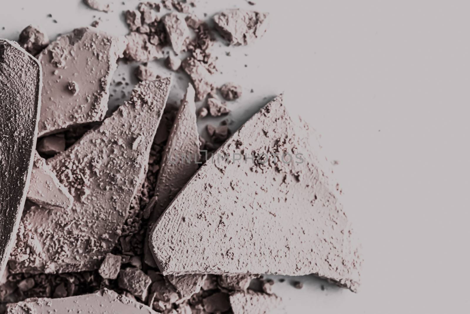 Pale eye shadow powder as makeup palette closeup, crushed cosmetics and beauty textures