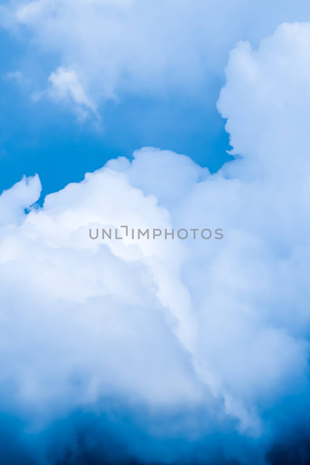 Dreamy blue sky and clouds, spiritual and nature background by Anneleven