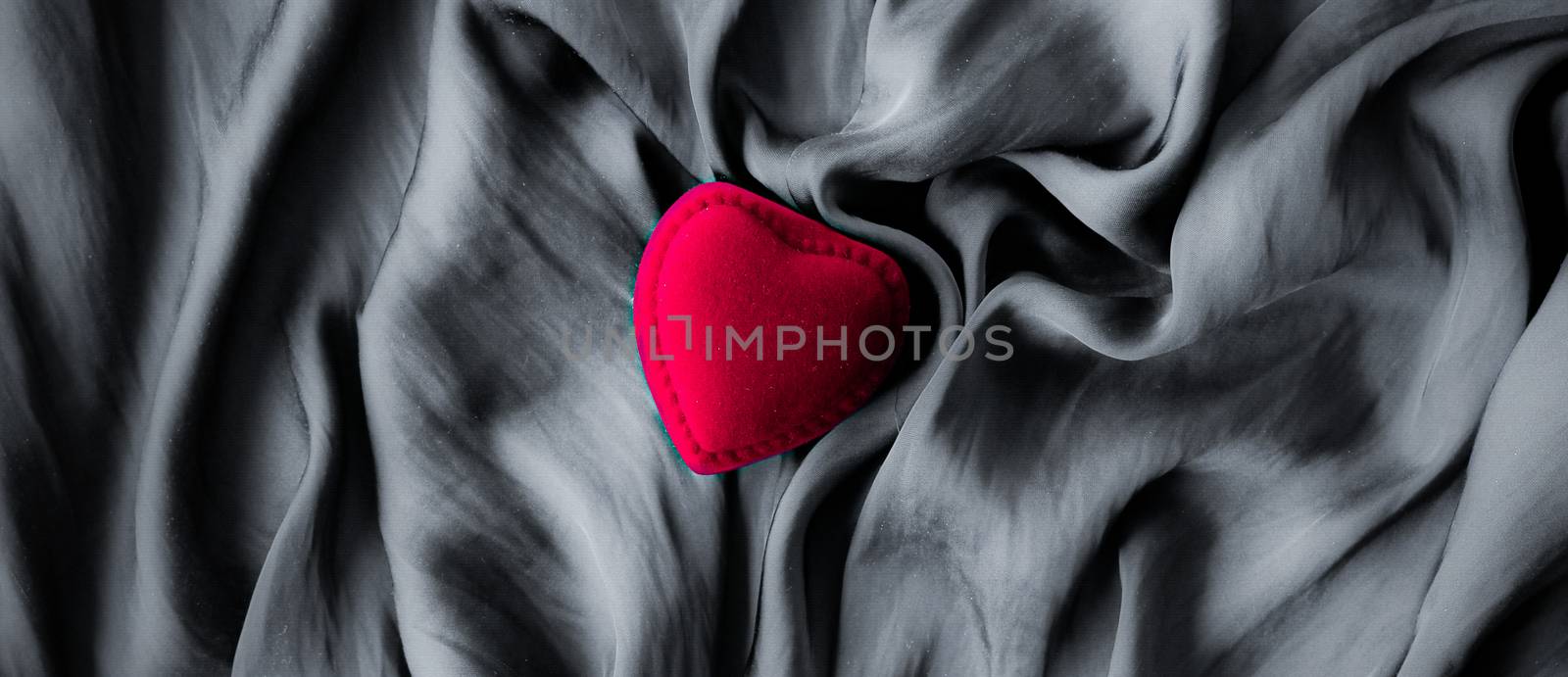 Romance, surprise and holidays concept - Valentines Day abstract background, heart shaped jewellery gift box on silk backdrop, love dating and engagement romantic present, luxury brand holiday design