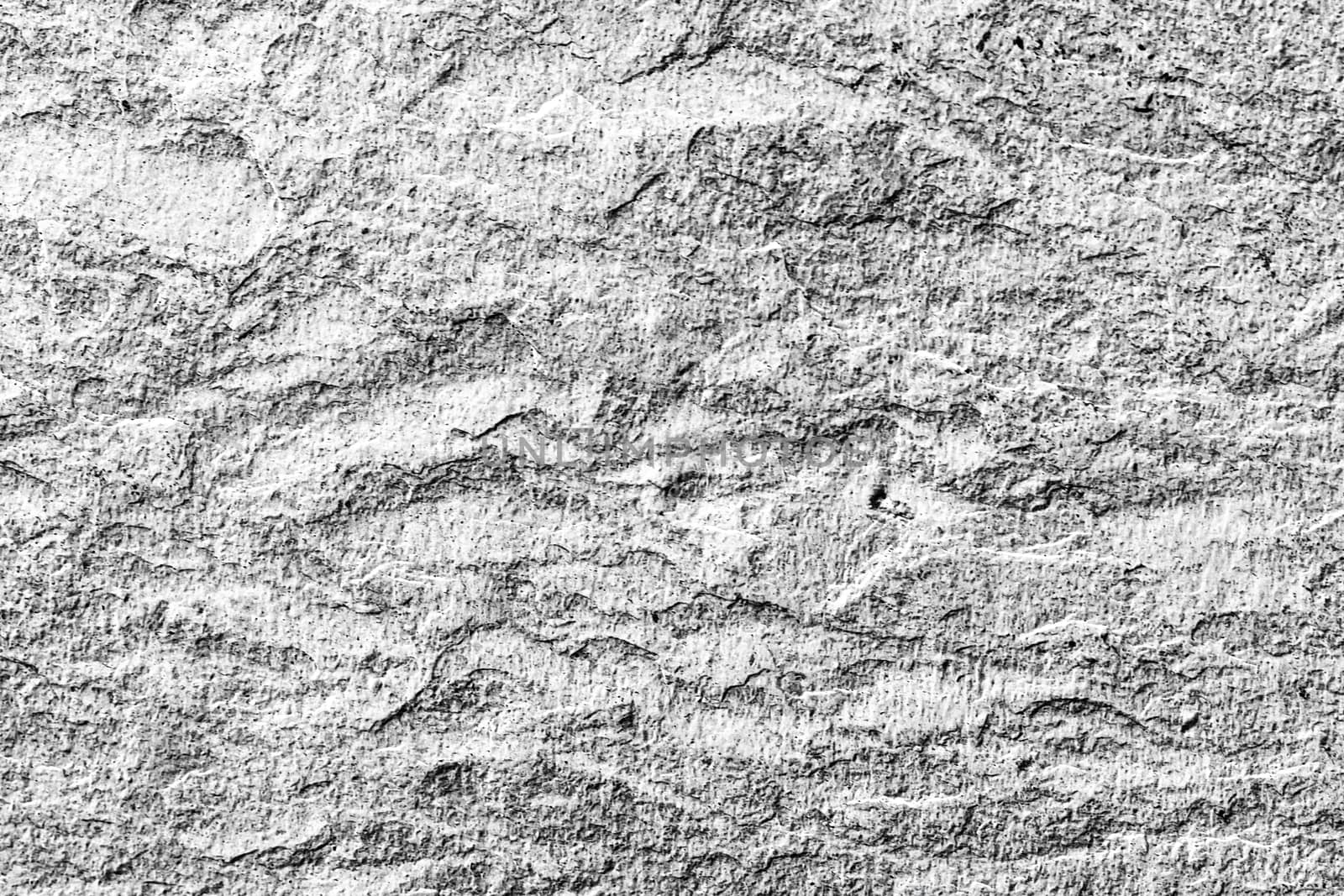 Light stone texture as abstract background, design material and textured surfaces