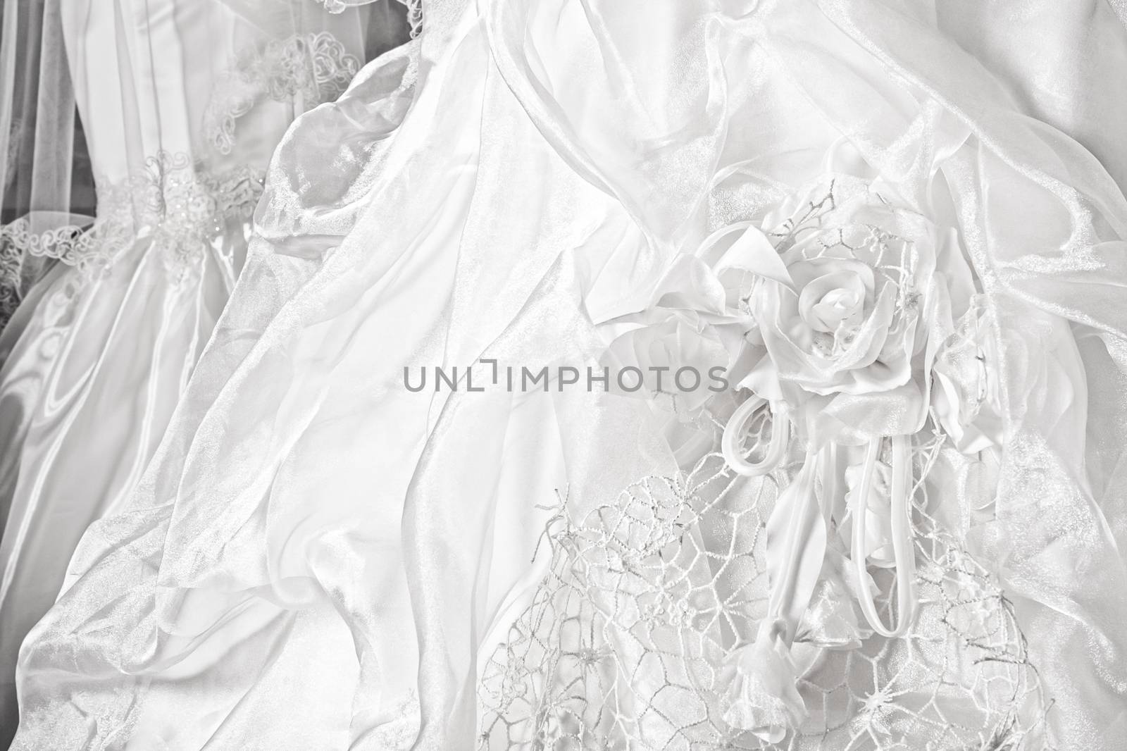 Wedding dresses in a bridal shop, fashion and style by Anneleven