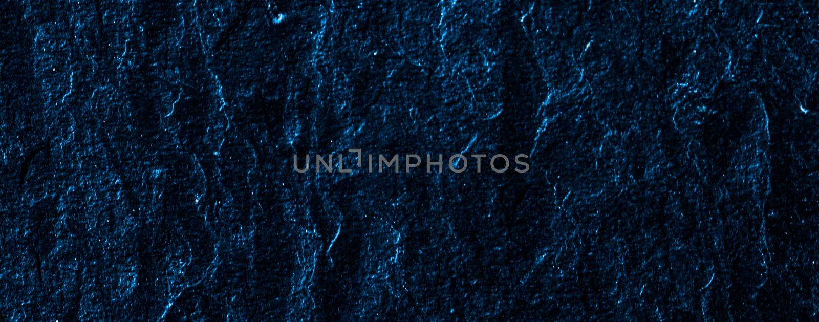 Blue stone texture as abstract background, design material and textured surfaces