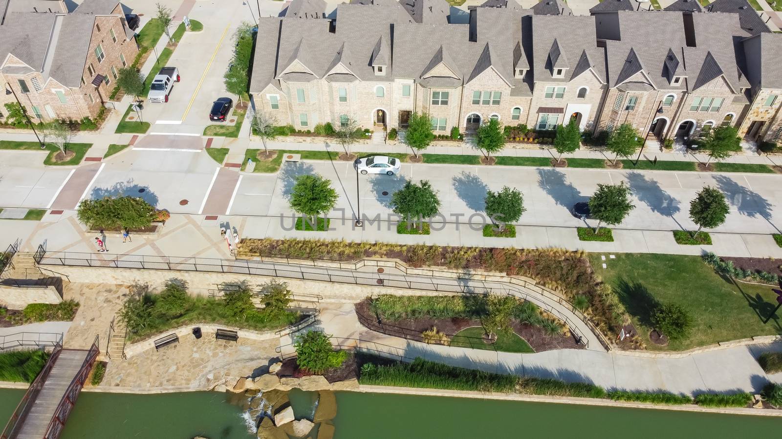 Aerial view riverside brand new two-story townhouses in downtown Flower Mound, Texas, US by trongnguyen
