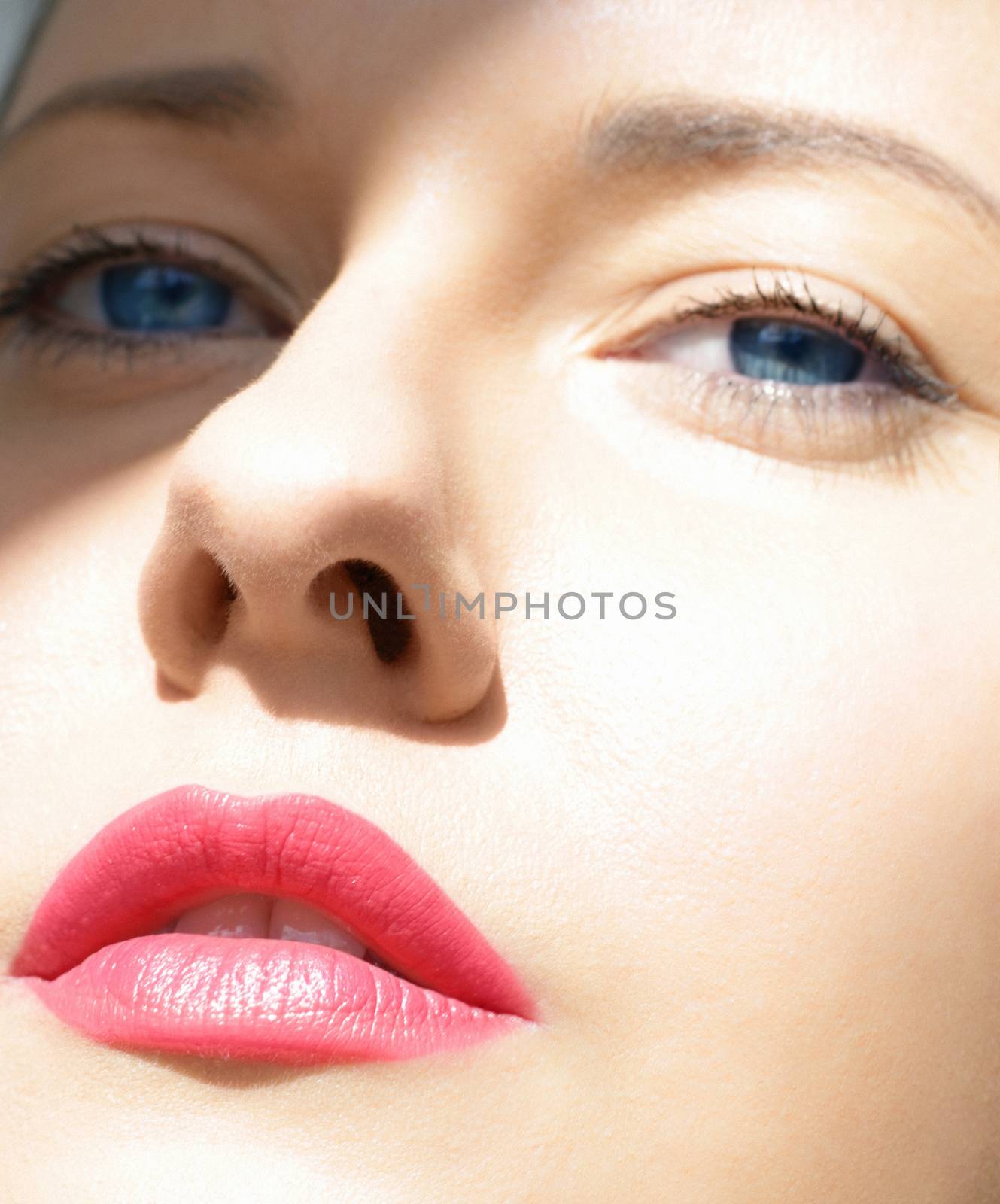 Beauty face closeup, red lipstick makeup look and perfect skin,  by Anneleven