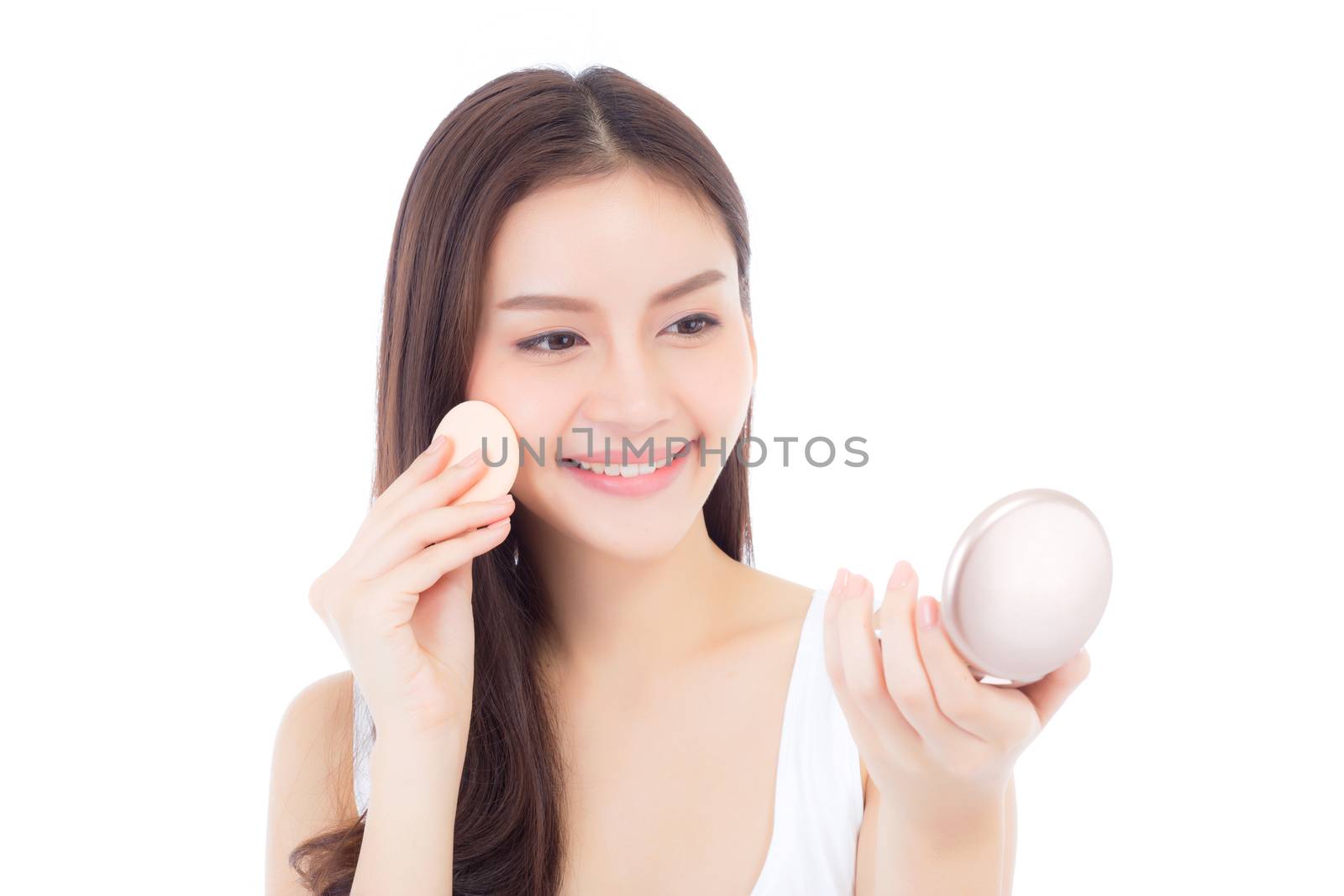 Portrait of beautiful asian woman applying powder puff at cheek makeup of cosmetic, beauty of girl with face smile isolated on white background, wellness and healthcare concept.