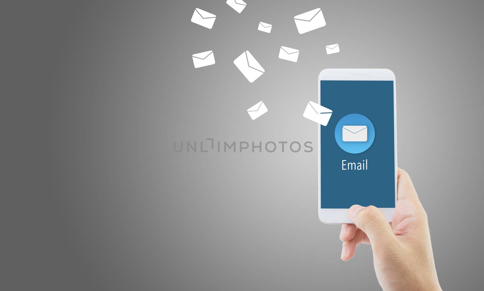 Hand holding man check and sending message with email in a phone on blue background, communication concept.