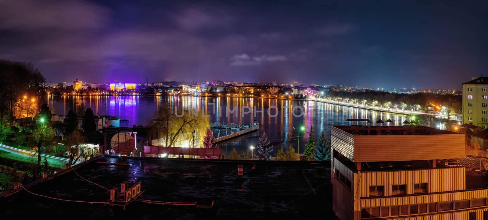 Ternopil, Ukraine 01.05.2020. Panoramic view of Ternopil pond and castle in Ternopol, Ukraine, on a winter night