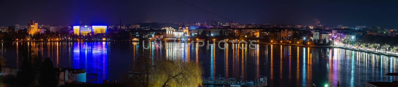 Ternopil, Ukraine 01.05.2020. Panoramic view of Ternopil pond and castle in Ternopol, Ukraine, on a winter night