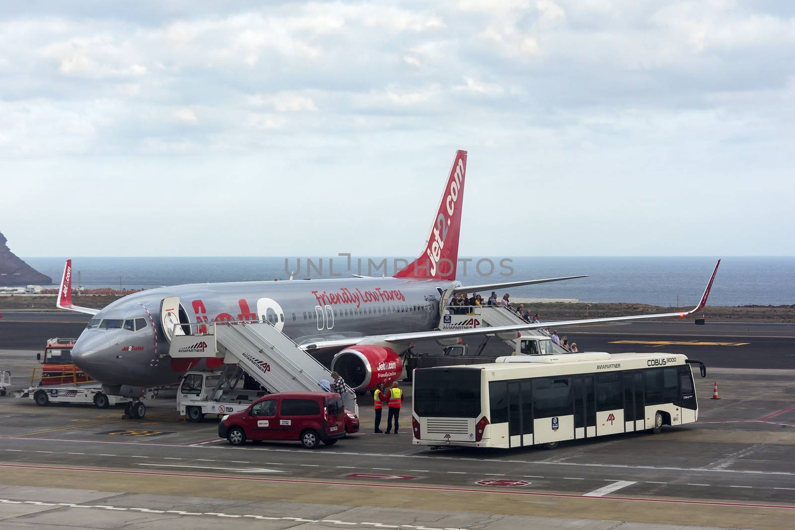 Passengers get out of The plane jet2 (Spain, Tenerife) by Grommik