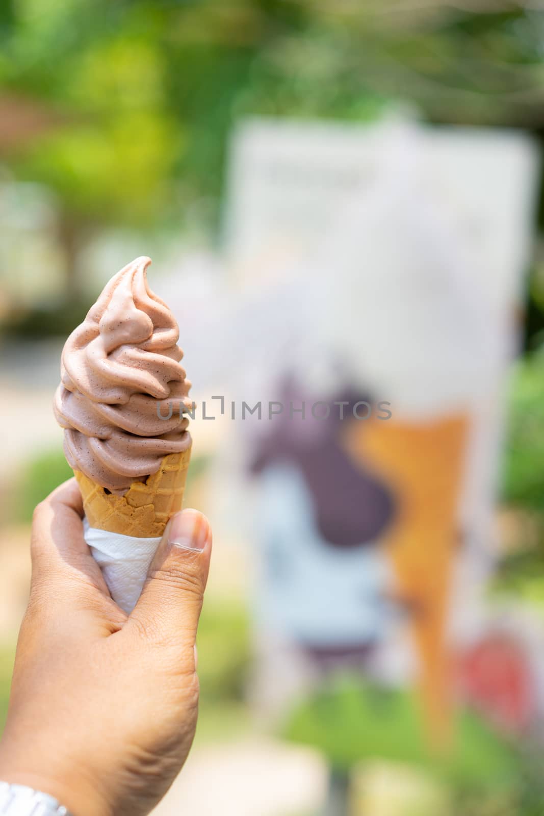 chocolate ice cream in hand by domonite