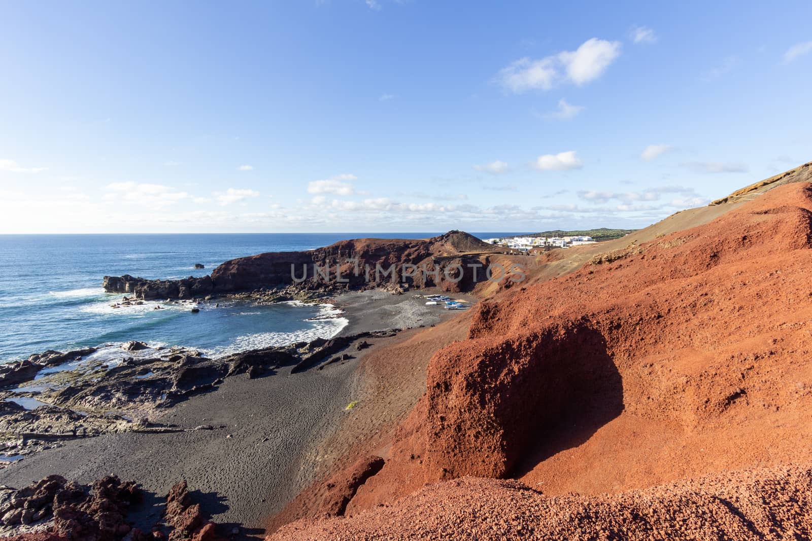 Panoramic view on the coastline of El Golfo with red and black c by reinerc