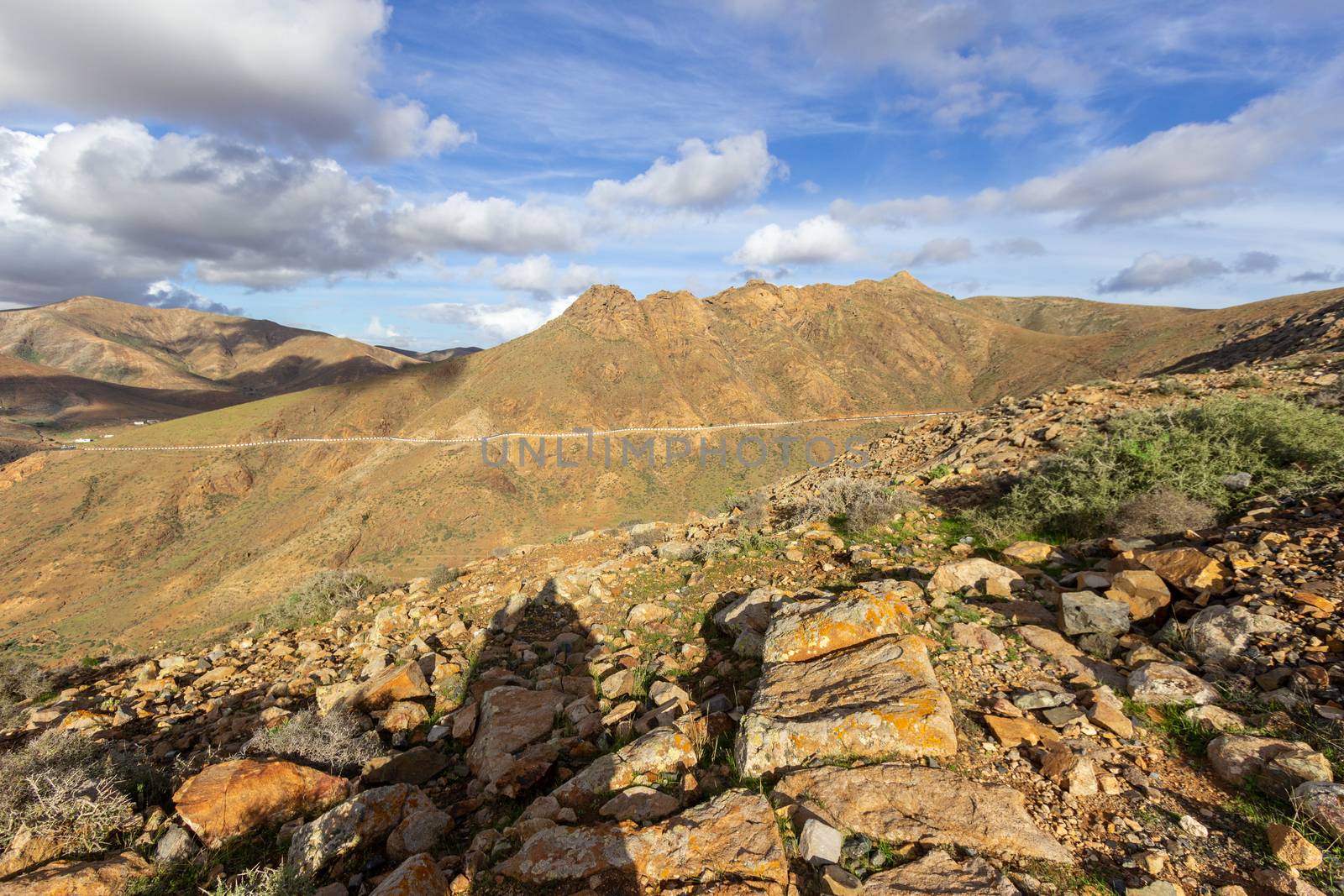 Panoramic view at landscape between Betancuria and Pajara  on Fuerteventura, Spain with multi colored volcanic hills and mountains