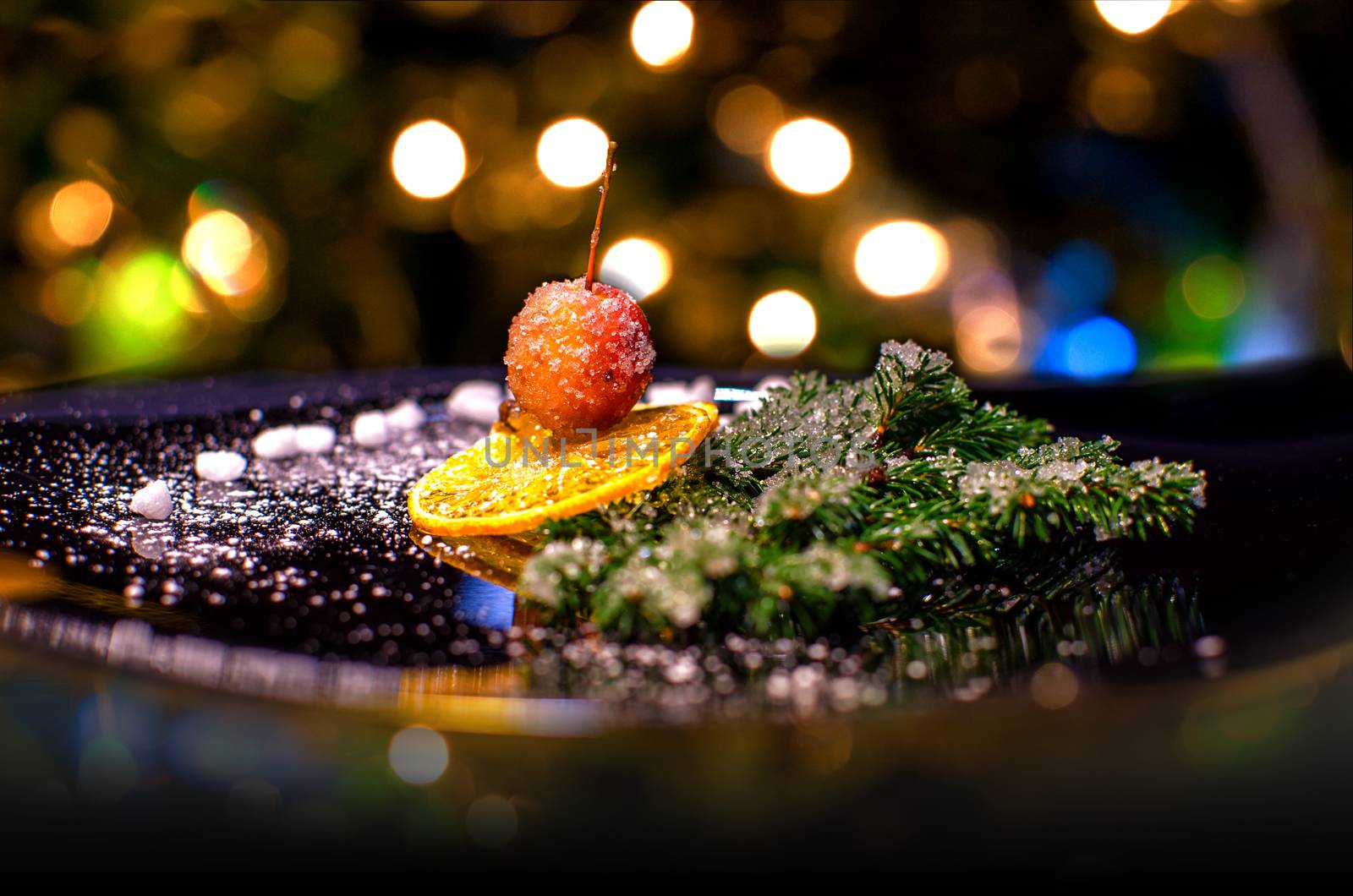 Christmas setting festive decorations with cherry. Creative Christmas composition with cherry and christmas tree. Stock photo