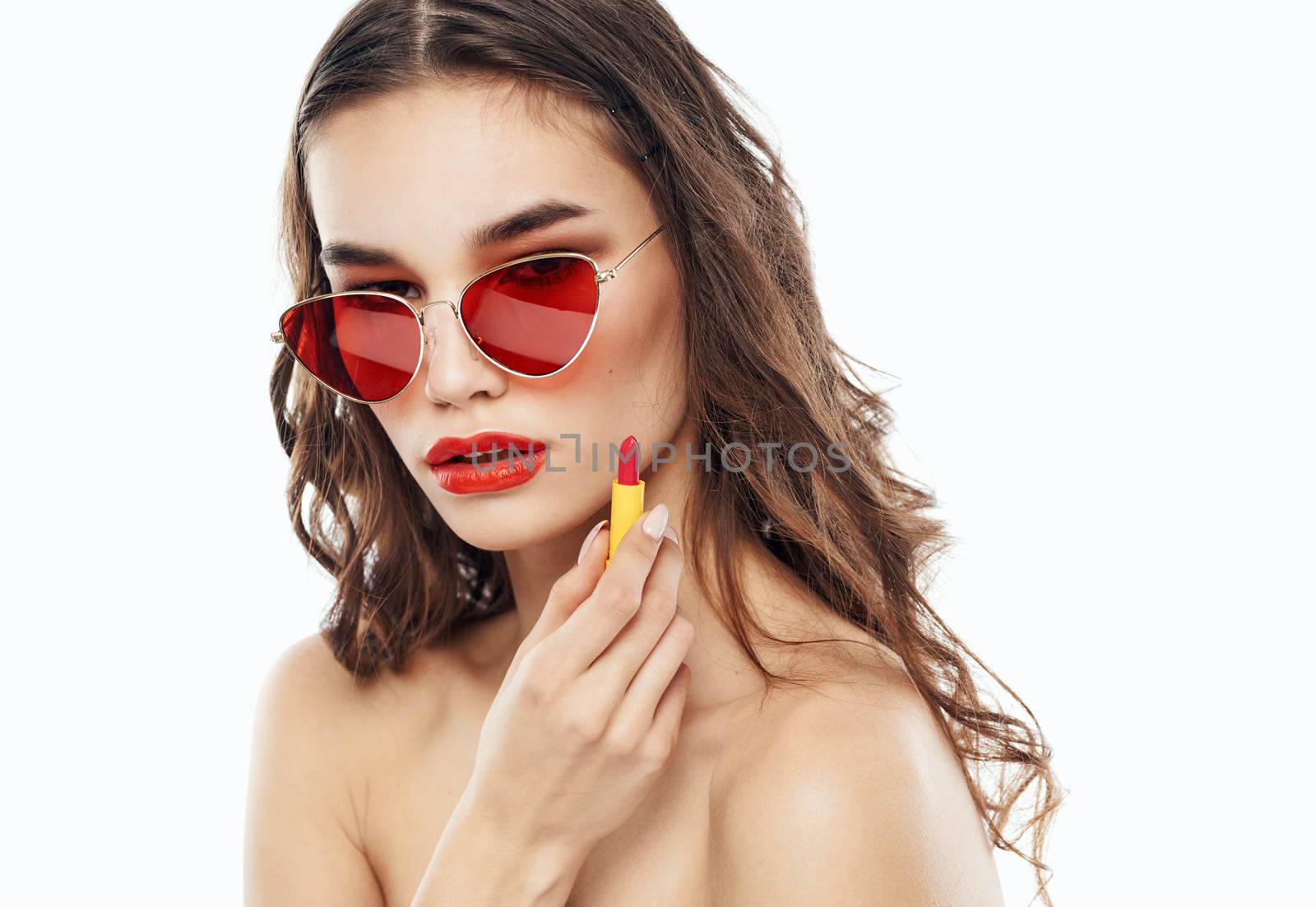 Sexy brunette with bright makeup lipstick model sunglasses. High quality photo