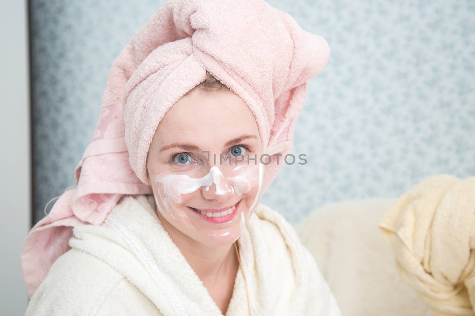 Portrait of woman doing doing spa treatments in the bedroom by galinasharapova