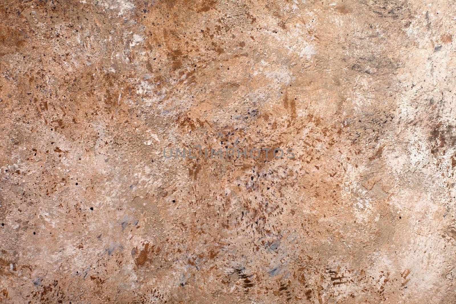 Concrete beige brown black background with scuffs and splashes. Textured wall texture in the grunge style with soft focus. Space for text