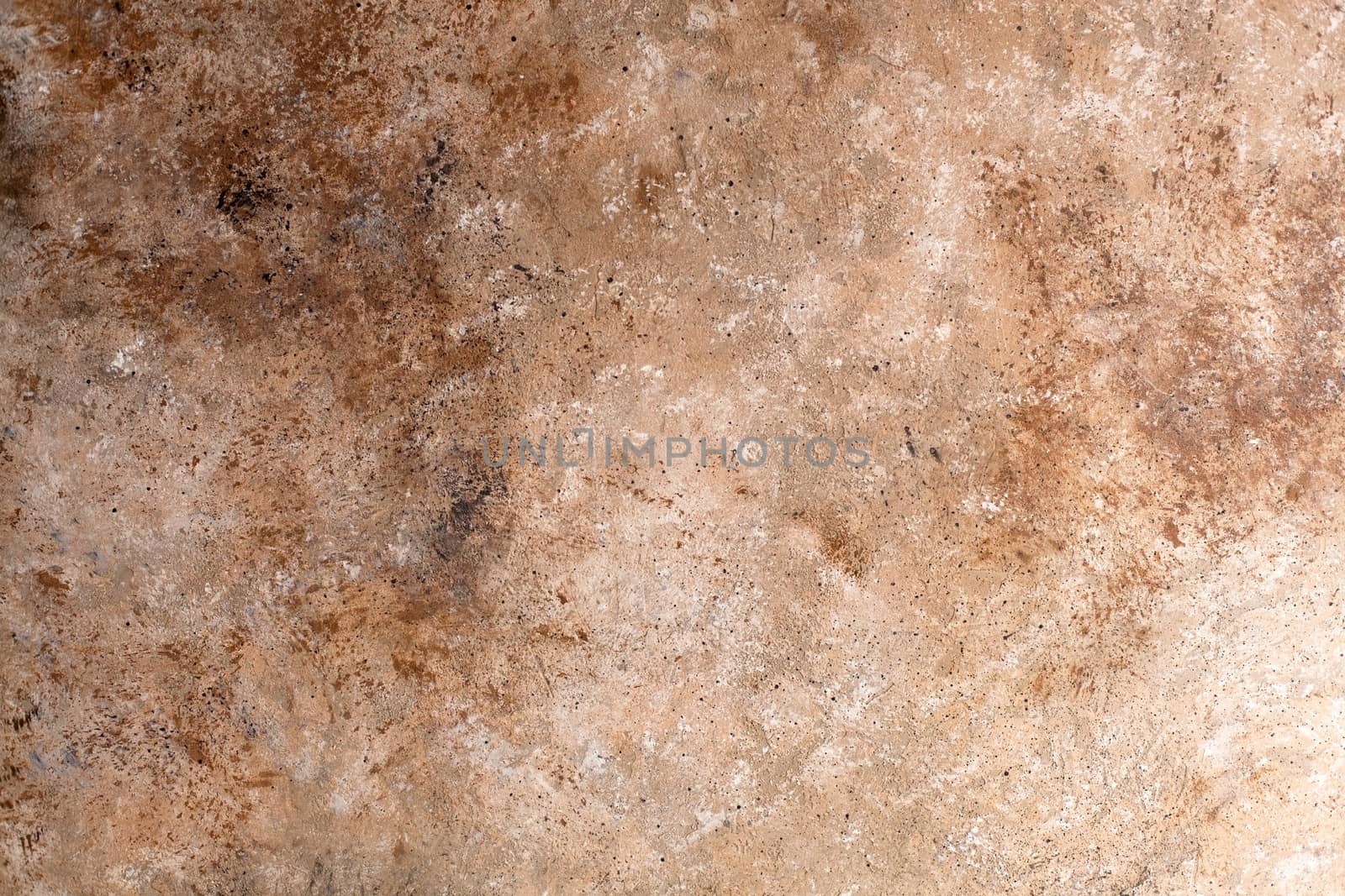 Concrete beige brown black background with scuffs and splashes. Textured wall texture in the grunge style with soft focus. Space for text