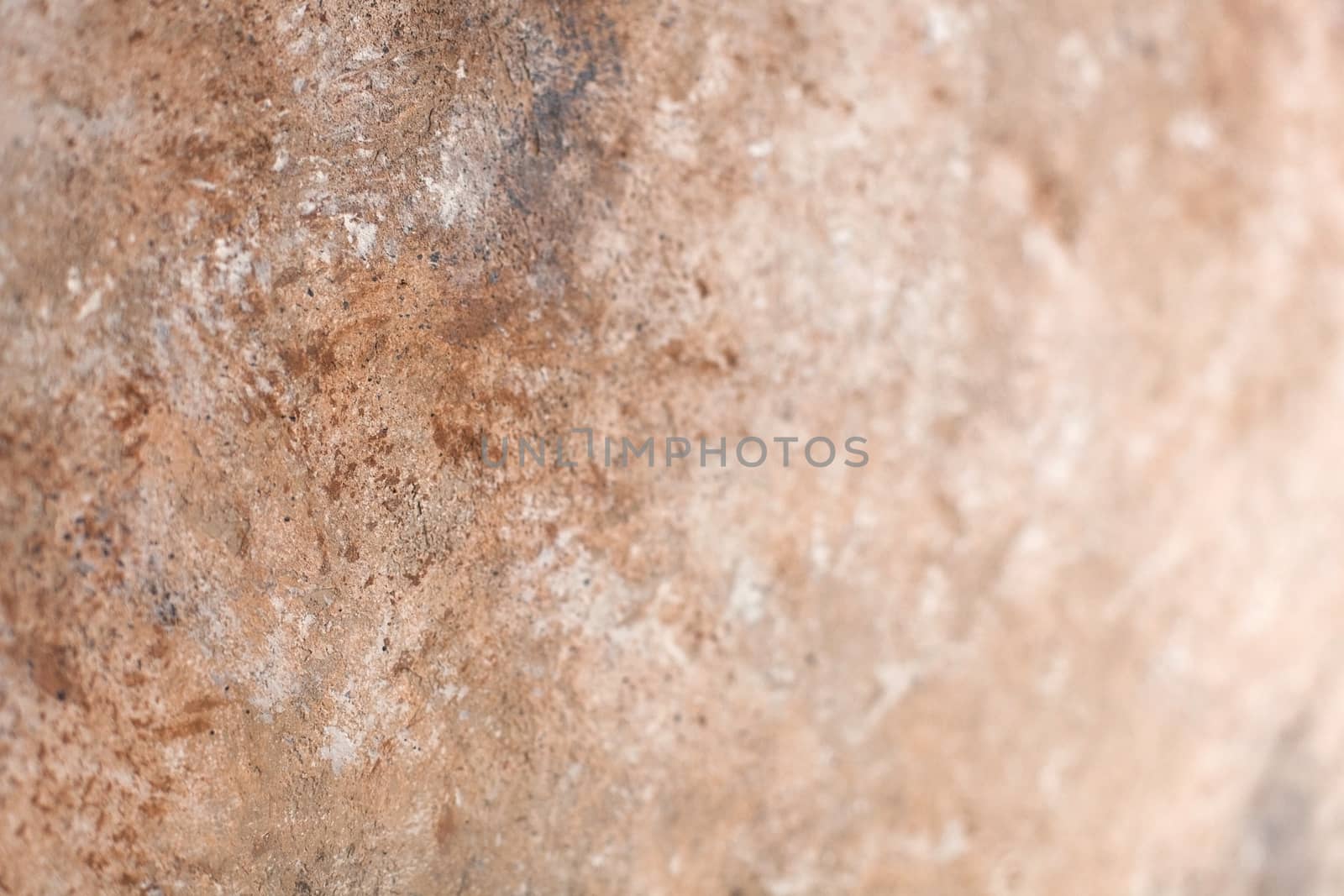 Concrete beige brown black background with scuffs and splashes. Textured wall texture in the grunge style with soft focus. Space for text