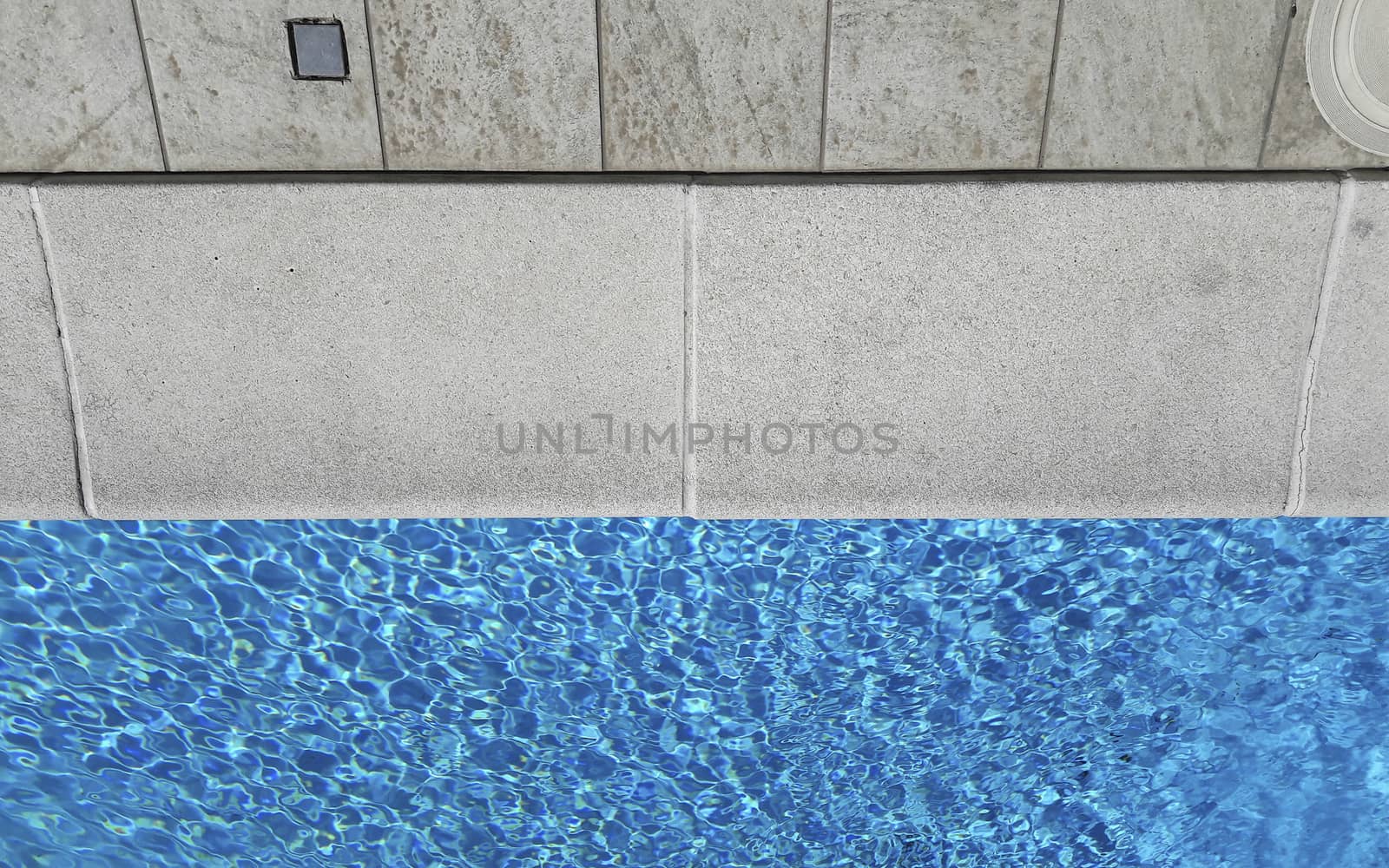 Detail of a beautiful swimming pool edge by marcorubino