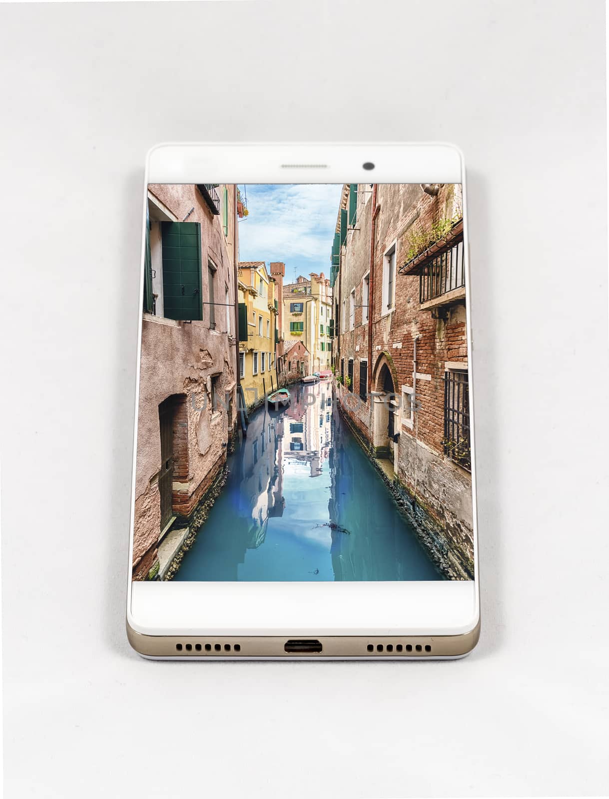 Modern smartphone displaying full screen picture of Venice, Ital by marcorubino