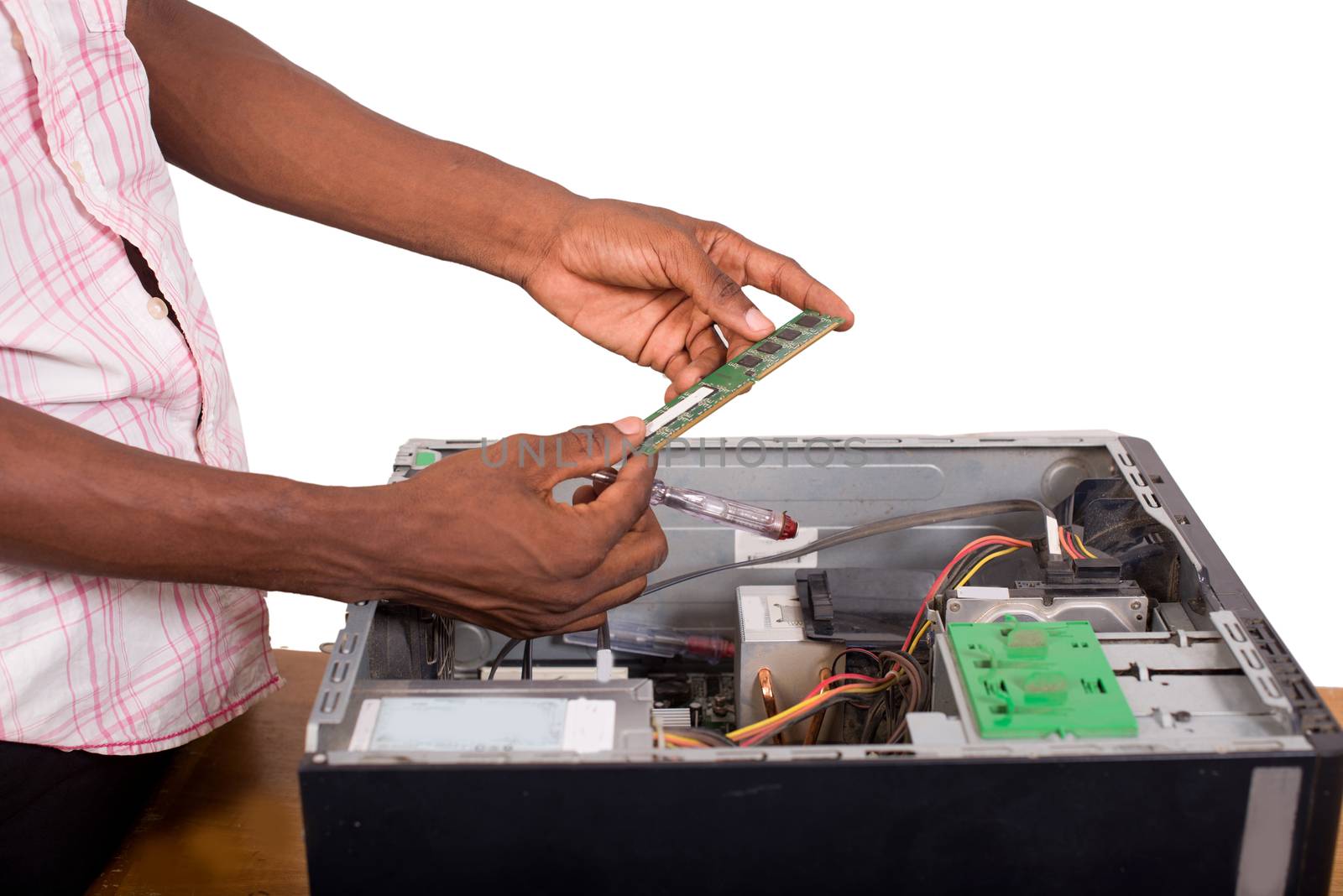 closeup of technician hands repairing a computer while holding a memory pad isolated on white background