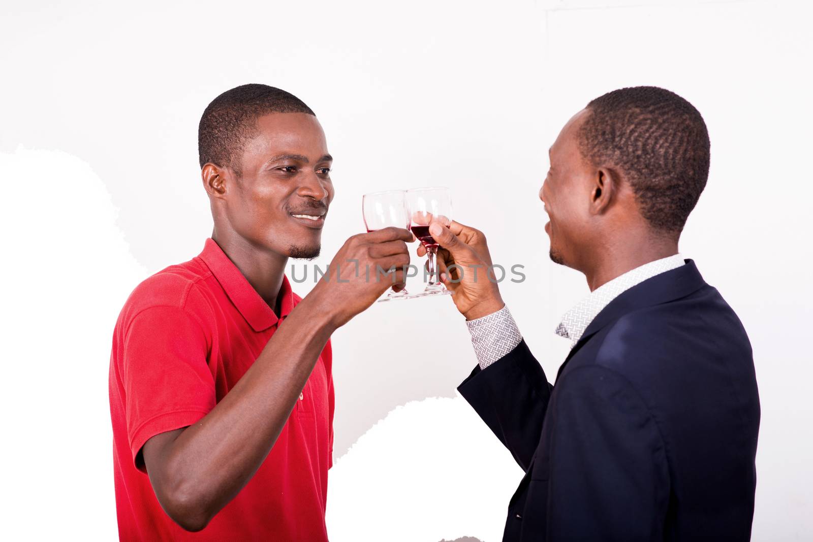 celebration, between two happy business people holding glasses of wine and toast