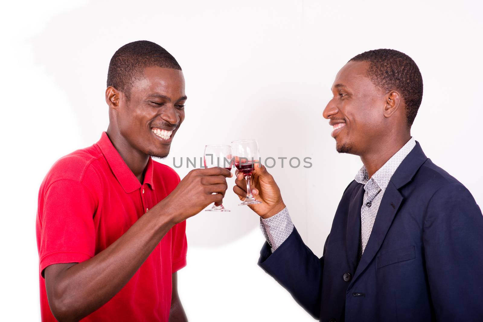 celebration, between two happy business people holding glasses of wine and toast