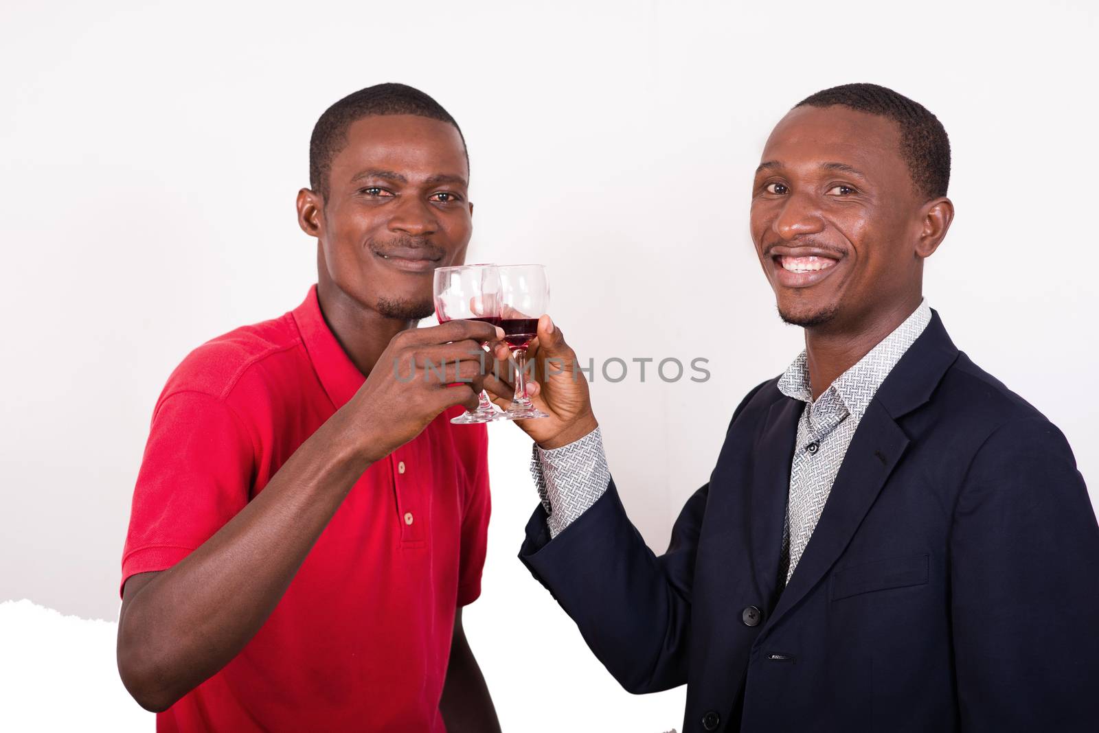 celebration, between two happy business people holding glasses of wine and toastcelebration, between two happy business people holding glasses of wine and toast