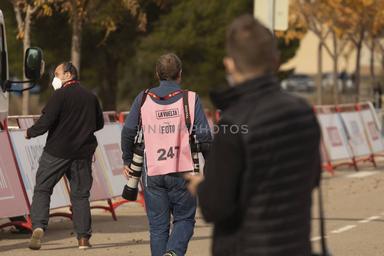 Photojournalists, photographers and media, working in the finish line area of the fourth stage of La Vuelta a España 2020.