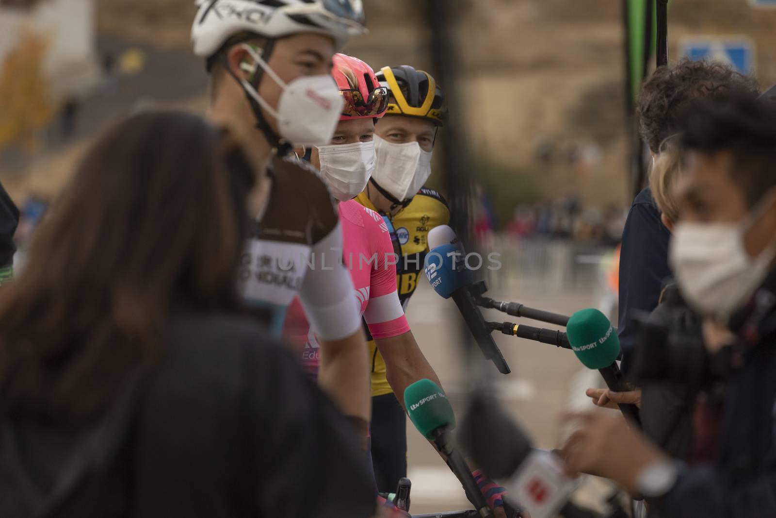 Journalists, photographers and the media, interviewing the winners of the fourth stage of La Vuelta a España 2020.