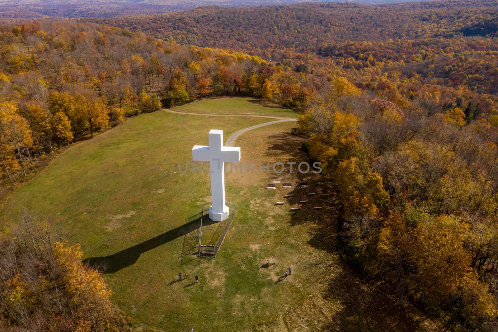 Aerial drone view of the metal structure of the Great Cross of Christ on Dunbar's Knob in Jumonville, PA