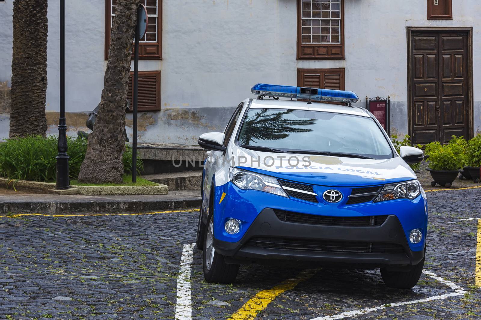 Police car labeled Policia Local on the door (Spain, La Orotava by Grommik