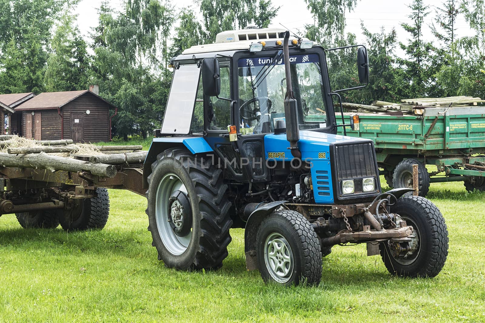 Wheel tractor Belarus on a farmstead (Belarus, Minsk) by Grommik