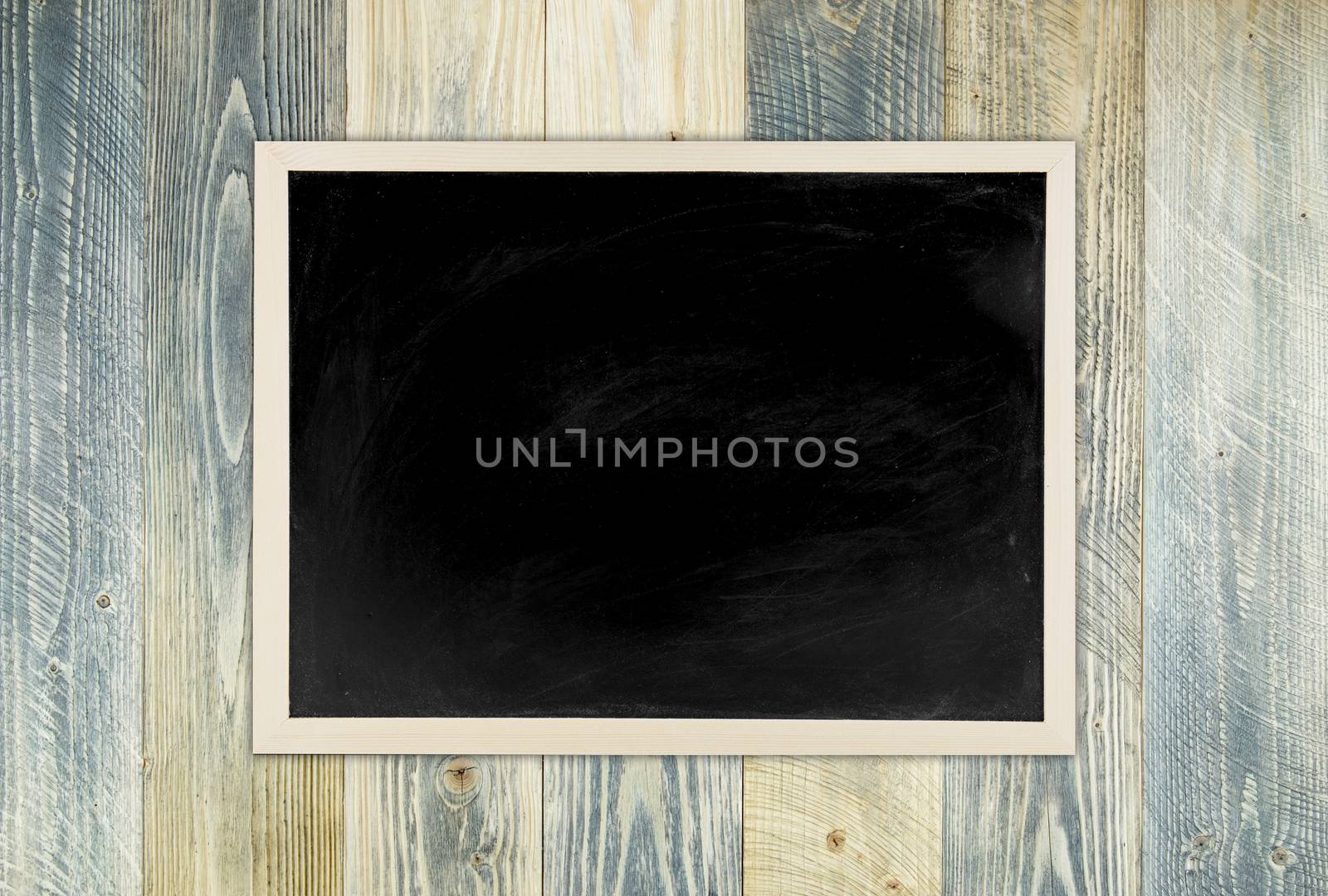 blackboard with wooden frame, blackboard on old wood background for education concept.