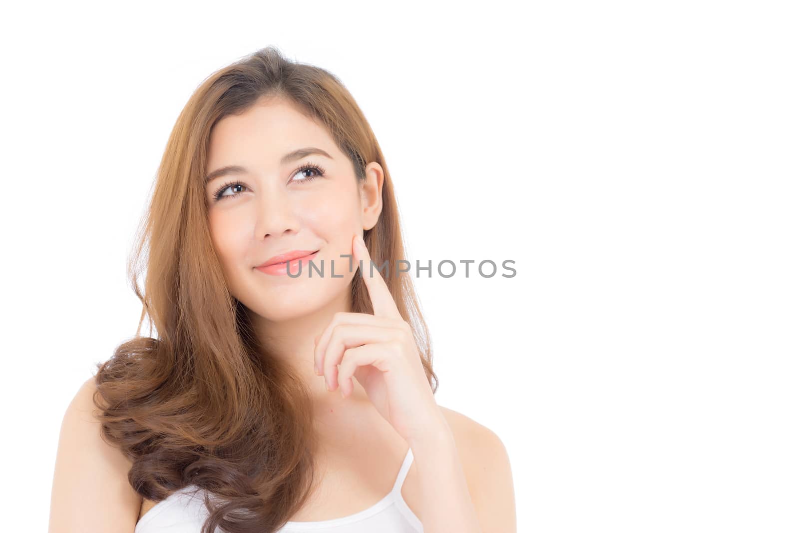 Portrait of beautiful asian woman thinking something and makeup of cosmetic - girl hand touch cheek and smile on attractive face with skin healthcare concept isolated on white background.