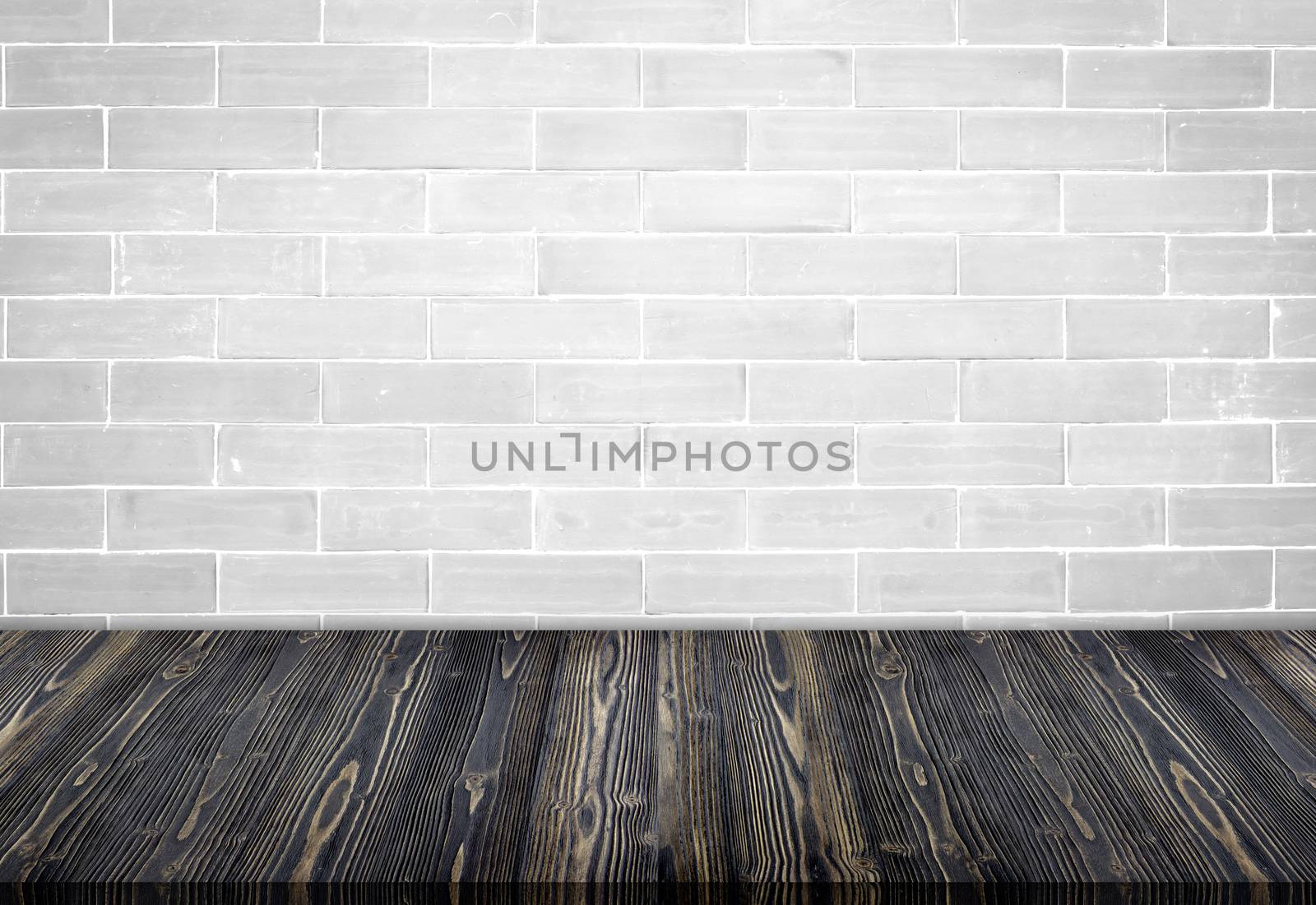 Empty wooden table top with grunge brick white vintage template background, texture brickwall, can be used for display your products.