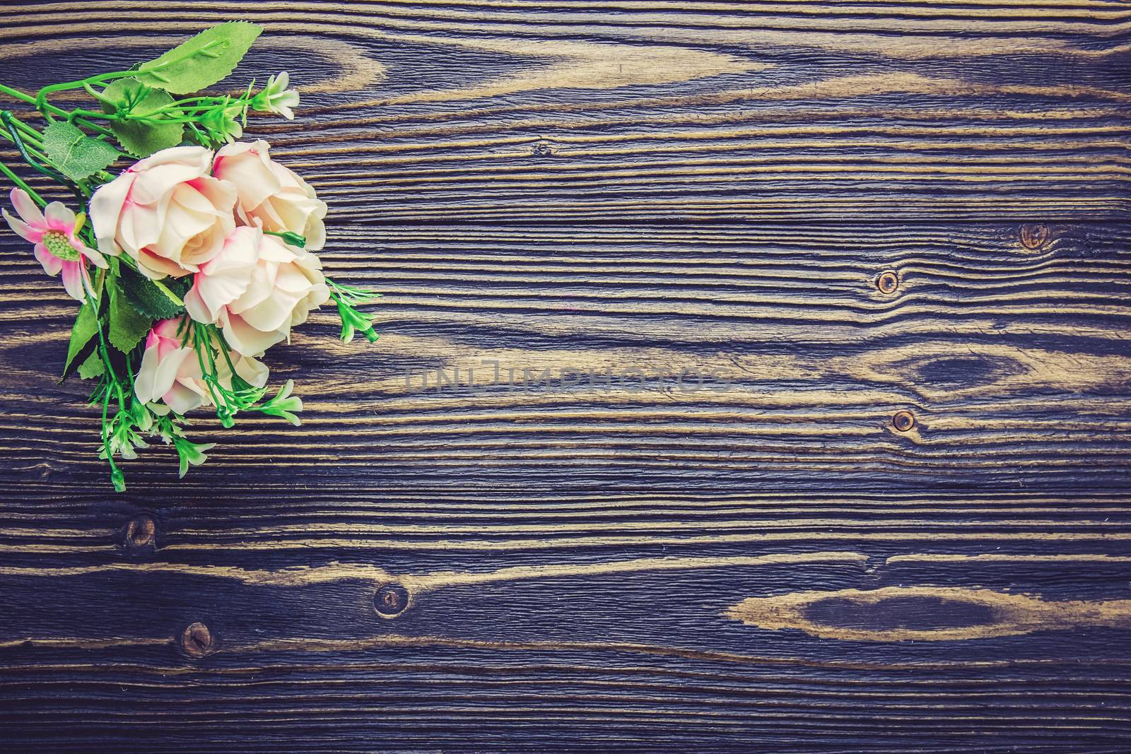 Bouquet of flower and empty rustic wooden table with copy space, table empty with flower romantic, top view, vintage retro style.