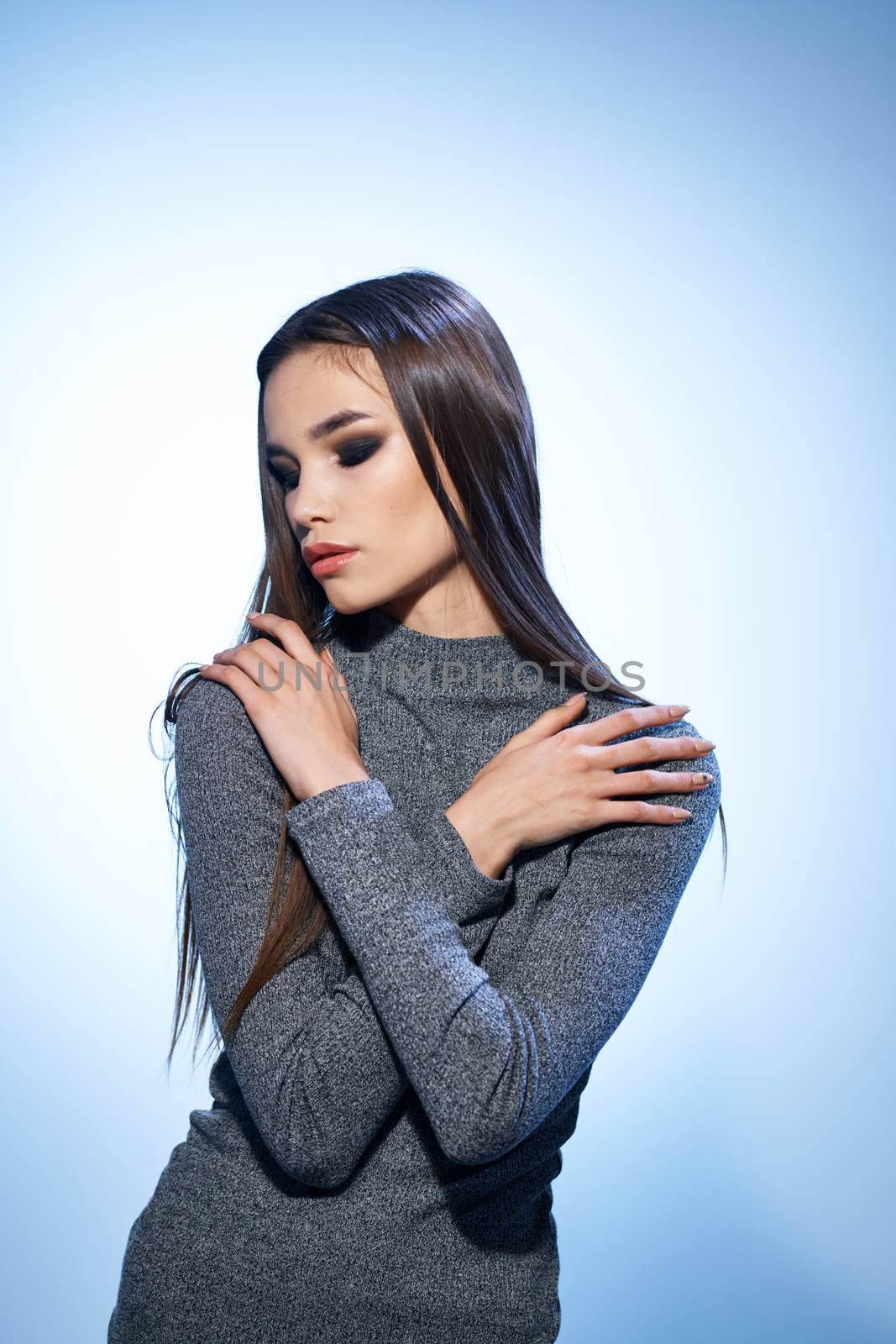 Beautiful woman cosmetics long hair cropped studio model. High quality photo