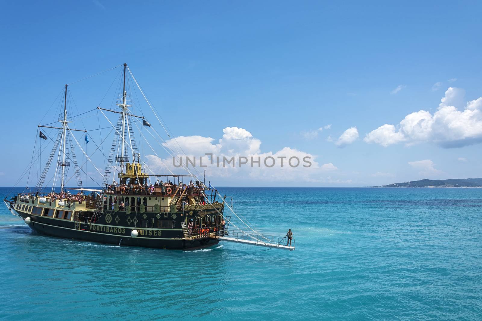 Greece, Zakynthos-09 June 2016: Pleasure boat with a sloping ladder preparing for mooring