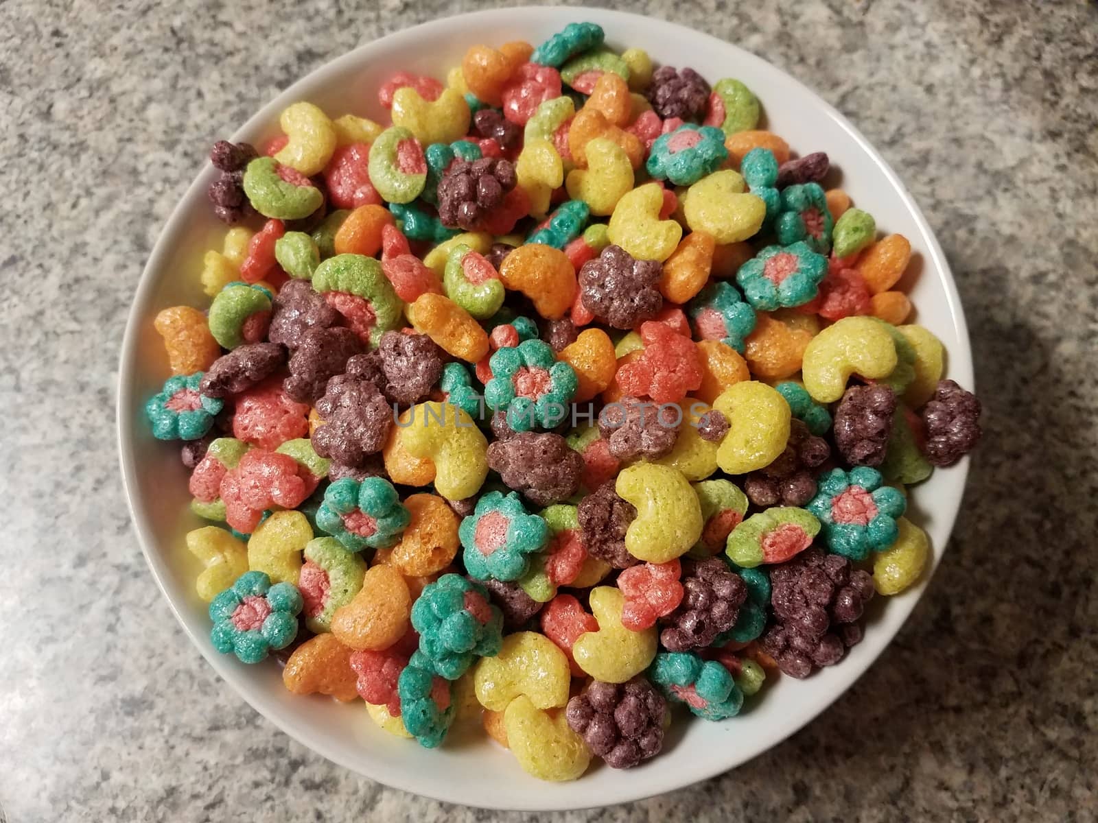 bowl of colorful fruit breakfast cereal on counter